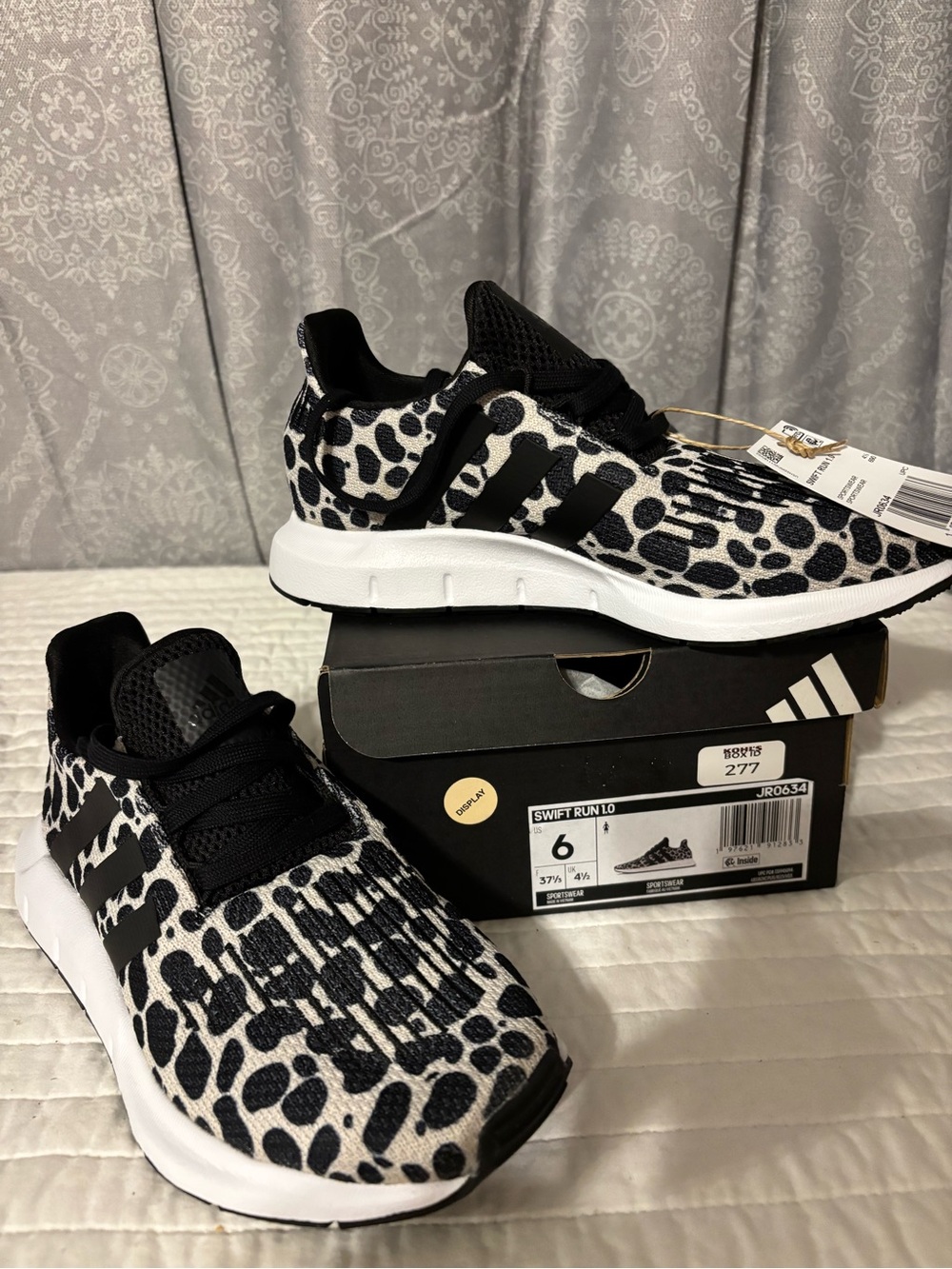 Adidas womenβs Black & White Animal Print Sneakers